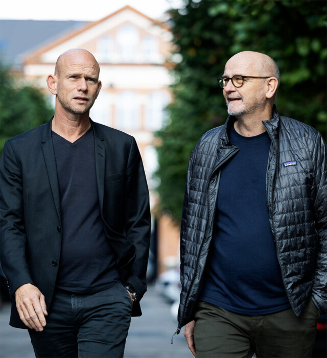 Photo of CBC (Cross-Border Communications) owners Managing Partner Ralph Krøyer and Senior Art Director Jeppe Grandgaard, walking in a street in Copenhagen